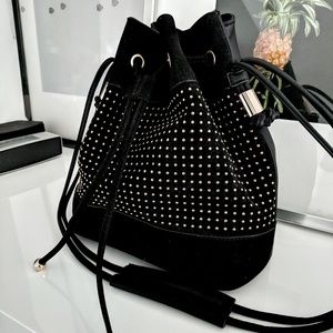 ASOS  black suede bucket bag with gold studs